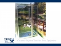 TriStar Vet kennel photo: A comfy overnight boarding area with stainless steel and glass doors