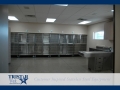 TriStar Vet treatment equipment photo: Stainless steel cages, sinks and tables for highly sanitary Parvo work